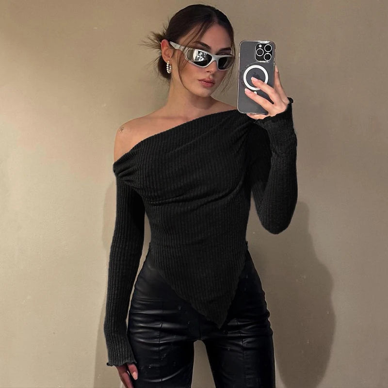 Camiseta asimétrica must-have de temporada 🖤 Elegancia + actitud